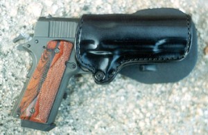 This time, the gun is wearing grips by Esmeralda and is carried in a Gunleather, Inc holster. Enough to melt the heart of any 1911 fan.